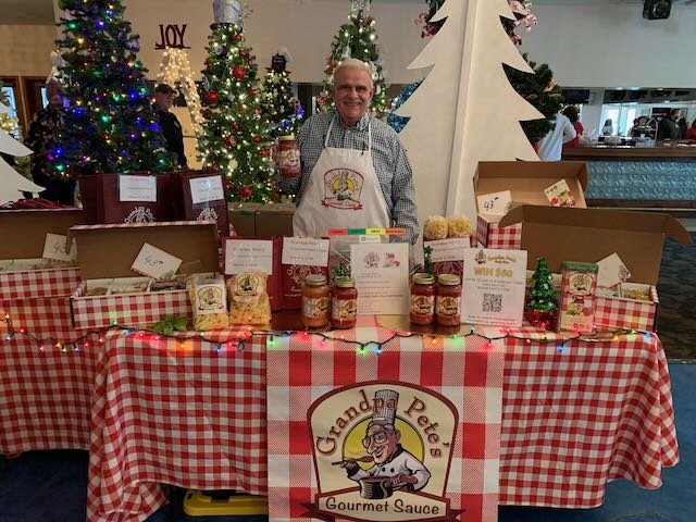 Festival of Trees - Charlie manning the booth